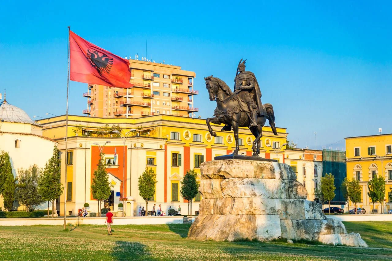 Skanderbeg-square-with-flag-Skanderbeg-monument-and-The-Ethem-Bey-Mosque-in-the-center-of-Tirana-city-Albania.jpg-1 Skanderbeg-square-with-flag-Skanderbeg-monument-and-The-Ethem-Bey-Mosque-in-the-center-of-Tirana-city-Albania.jpg-1